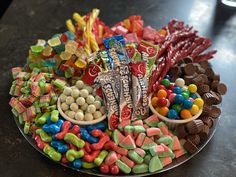 a platter filled with candy and candies