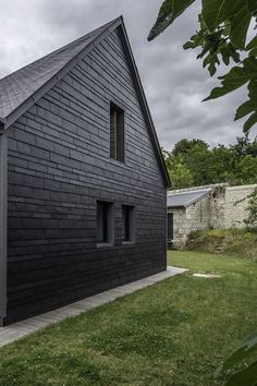 the house is made out of black wood