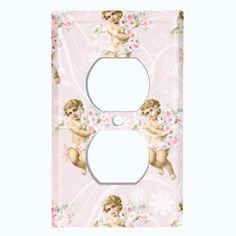 a light switch cover with an angel on it's face and flowers in the background