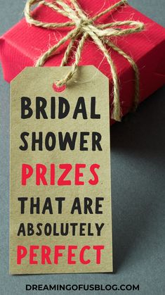 a red gift box with a brown tag that says, bridal shower prizes that are absolutely perfect