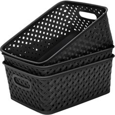 two black baskets sitting next to each other