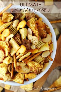 a bowl filled with cheesy party mix