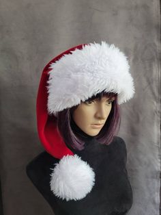 SIZING   Average hats will fit average heads up to 23 inches. Large will fit 24.5, XL fits up to 26 inches. That's a big ole head with a wig on it!! They are made from a gorgeous deep red velvet that is so buttery soft. The hat is lined, and it has an overly generous brim and ball in a bright white. I was asked to make a hat similar to the hat in the Santa Clause with Tim Allen, and this is what I came up with. The ball is attached directly to the end of the hat. Stocking Hat, Faux Snow, Christmas In July Sale, White Trim, Santa Hat, Deep Red, Santa Claus, Red Velvet, Caps Hats