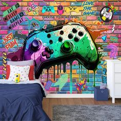 a bedroom scene with focus on the colorful video game controller mural