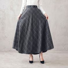 "This winter wool skirt is a classic piece of tailoring that will see you through rain or shine. It is cut with a flattering flared skirt to give you a wonderful shape. The winter skirt is perfect classic styling and ends at the ankle. This is a versatile skirt that you'll wear again and again. DETAILS: * More colors available https://etsy.me/2WgHgmy * 30% wool, 30% fiber, 40% polyester * fully satiny liner * Two side pockets * Right zip closure * with belt loops * back elastic band to provide s Classic High Waist Skirt For Fall, Classic High-waist Skirt For Fall, Winter High Waist Pleated Maxi Skirt, High Waist Pleated Maxi Skirt For Winter, Wool Maxi Skirt For Workwear In Winter, Wool Pleated Long Skirt, Winter Maxi Skirt For Workwear, Classic Wool A-line Skirt, Wool Midi Pleated Skirt