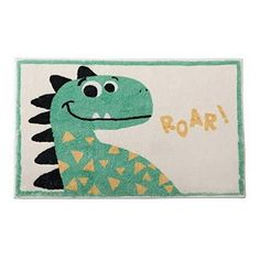 a door mat with a cartoon dinosaur on it's back and the words roar written in