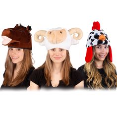 three girls wearing animal hats and smiling at the camera