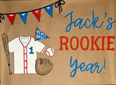 a birthday sign with a baseball jersey and glove