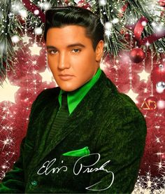 elvis presley in front of a christmas tree