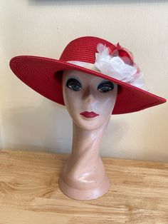 This one of a kind Red 4 inch brim Toyo Straw hat is trimmed with a large red silk and organza rose,1 white silk rose, white satin  leaves and a white raw edged grosgrain ribbon.  The hat will fit 22- 22 1/2 inch head size. NOTE: Please check the head size before purchase, I am happy to answer any questions you may have. There will be a 20% restocking fee for all returned hats. Red And White Flowers, Organza Flowers, Elegant Hats, Silk Rose, Red Sun, Derby Hat, White Velvet, Silk Roses, Derby Hats