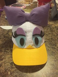 a hat with an angry bird face on it