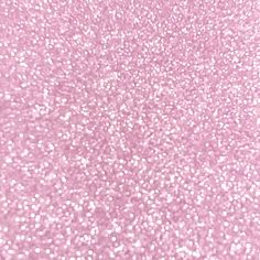 a pink glitter background with lots of small dots