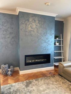 a living room with blue walls and a fireplace