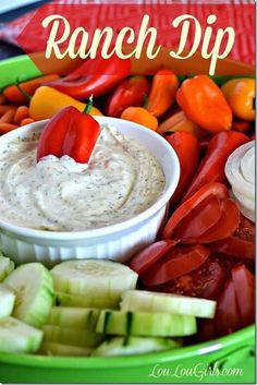 a platter filled with vegetables and dip