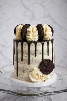 a cake with oreo cookies and cream on top