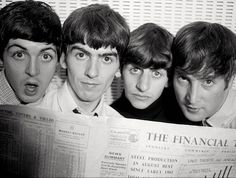 three men are looking at a newspaper with their mouths wide open and one man is reading the news