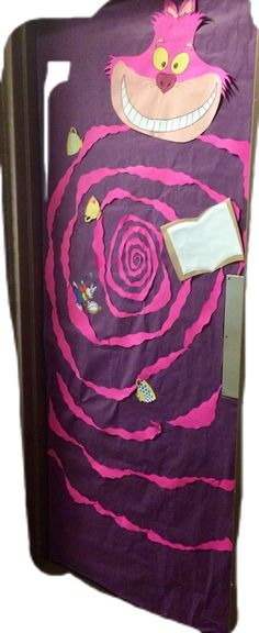 the door is decorated with pink and purple paper machs, including a cat's head