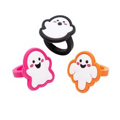 three rings with ghost faces on them, one is pink and the other is orange