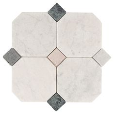 a white marble tile with grey and pink accents on the edges, arranged in an octagon pattern