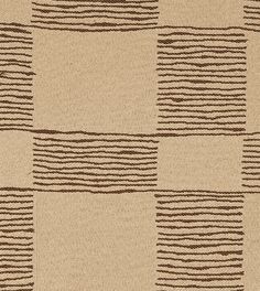 a beige and brown checkered rug with lines drawn on the ground in different directions