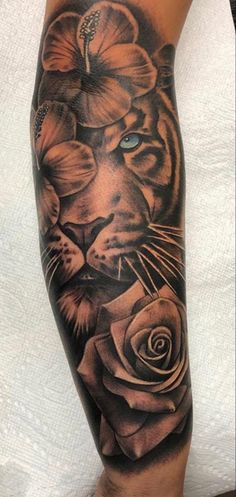 a tiger with flowers on his leg