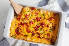 a casserole dish with cheese and bacon