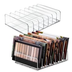 a display rack with various cosmeticss and eye shadows in different colors, including one for eyeshades