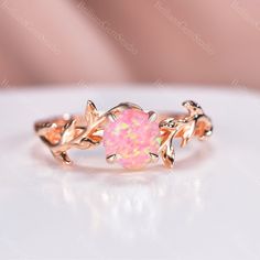 ☆Engagement Ring Details☆ -Center stone: 6mm Pink Fire Opal -Shape: Round Cut Band Width: 1.6mm ☆Material☆ 925 Sterling Silver, Rose Gold Plated, Yellow Gold Plated (Hypoallergenic, Nickel Free, Tarnish Resistant) Solid 10K/14K/18K Rose Gold/White Gold/Yellow gold(PLEASE choose 925 Sterling Silver or Platinum as material if you are allergic to nickel.) ☆Service Available☆ ☆Rush Order ☆Payment Plan ☆Engrave Service (should be less than 10 letter) ☆Customized Available ☆14 Days Return Policy ☆Ring Chicken Wedding, Leaf Wedding Ring, Fire Opal Engagement Ring, Wedding Ring Antique, Pink Opal Ring, Rose Gold Promise Ring, Pink Fire, Twig Engagement Ring, Twig Ring