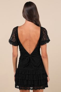 There are so many reasons to love the Lulus Darling Persuasion Black Lace Puff Sleeve Tiered Mini Dress! Romantic, sheer floral lace shapes this adorable dress with a flattering V-neckline framed by puff sleeves with elastic at the shoulders and cuffs. The fitted bodice features flattering ruching throughout as it continues into a drop waist silhouette that falls to a tiered mini hem. Turn around to reveal a deep V-back adorned with a bold, bow-like detail. Hidden side zipper. Fit: This garment Grad Fits, Recruitment Dresses, Mini Dress With Bow, Mini Dress Lace, Prom Dance, Banquet Dresses, Tiered Mini Dress, Lace Dress With Sleeves, Cute Prom Dresses