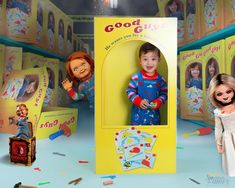 two dolls are standing in front of a cardboard box with the same character on it