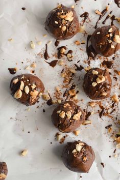 chocolate truffles with nuts and sea salt sprinkled on the top