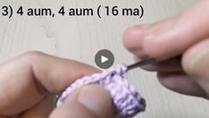 someone crocheting the end of a piece of yarn with their thumbnails