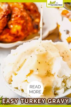 a bowl filled with mashed potatoes covered in gravy