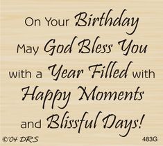 a wooden plaque with the words on your birthday may god bless you with a year filled with happy moments and blissful days