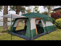 a tent is set up in the grass