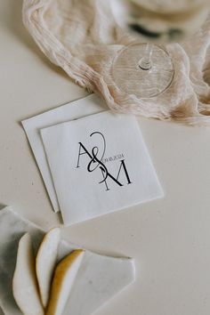 two napkins sitting next to each other on a table