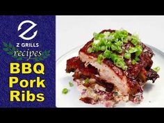 bbq pork ribs on a white plate with green onions