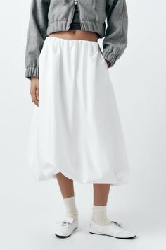 VOLUMINOUS MIDI SKIRT - White | ZARA United States White Skirt With Elastic Waistband And Relaxed Fit, White Relaxed Fit Skirt With Elastic Waistband, White Relaxed Fit Skirt For Daywear, Relaxed Fit Cotton Full Skirt, White Skirt For Daywear, White Skirt For Spring, Asymmetrical Relaxed Skirt For Daywear, White Relaxed Cotton Skirt, Spring Baggy Lined Maxi Skirt