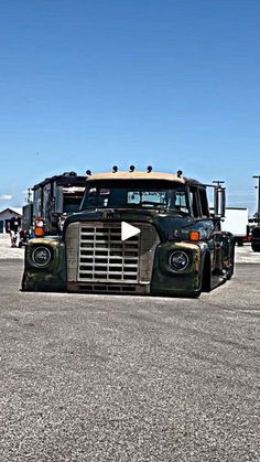 a large truck parked on top of a parking lot