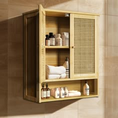 a wooden cabinet with bottles and soaps on it