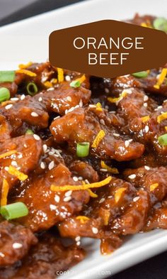 orange beef with sesame seeds and green onions