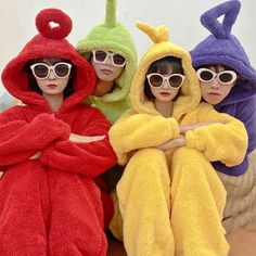 three women in bunny costumes posing for the camera