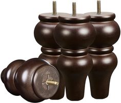 a group of brown vases sitting next to each other