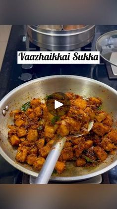 a pan filled with food sitting on top of a stove