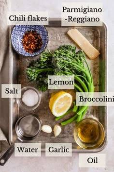 ingredients to make broccoli soup on a baking sheet with labels labeled in italian