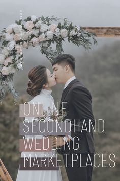 a man and woman kissing in front of a floral arch with the words online secondhand wedding market places