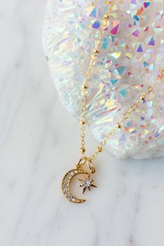 "⭐️ Bright Moon Necklace ⭐️ Made with the following: Gold Plated Cubic Zirconia Star Pendant 10mm x 8mm Gold Plated Cubic Zirconia Moon Pendant 10mm x 5mm 14K Gold Filled Findings 14K Gold Filled Spring Clasp 14K Gold Filled Chain Please select the chain and length from the drop down menu. The length does not include the pendant. Please select if you would like a 2 inch extender chain from the drop down menu. This listing is for one necklace. The last picture shows the necklace paired with The P Dainty Moon Necklace, Opal Necklace Gold, Bright Moon, Starburst Necklace, Gold Moon Necklace, Star Necklace Gold, Necklace Moon, Fairy Jewelry