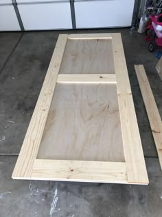 the unfinished plywood frame is ready to be assembled