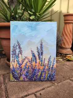 an acrylic painting of purple flowers in front of a potted plant