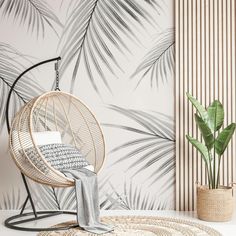 a rattan chair and rug in front of a wall with palm leaves on it